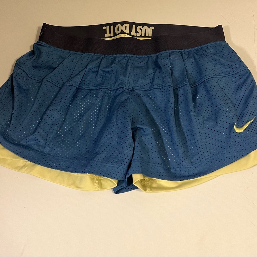 Nike Women's Blue Athletic Shorts with Yellow Trim